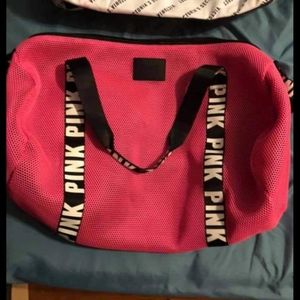 Pink duffle bag